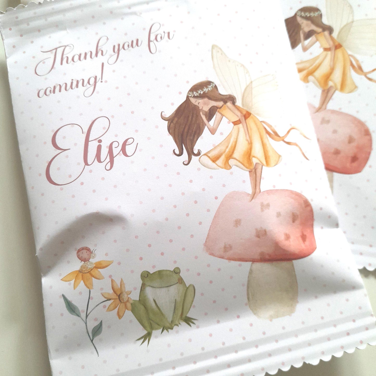 Fairy-themed treat bags with an elegant matte finish and a self-seal design. They can be personalized with a name, making them suitable for birthday parties.
