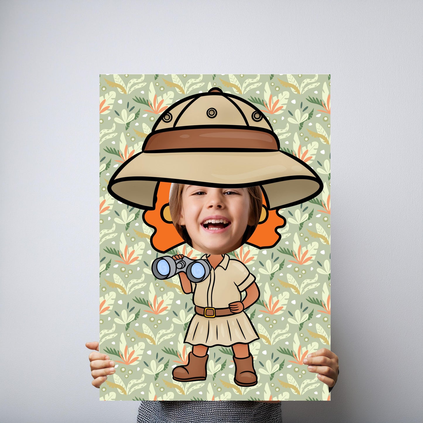 A lightweight foam photo booth prop designed as an explorer girl with a face cut-out. It's ideal for kids' safari or jungle-themed parties.