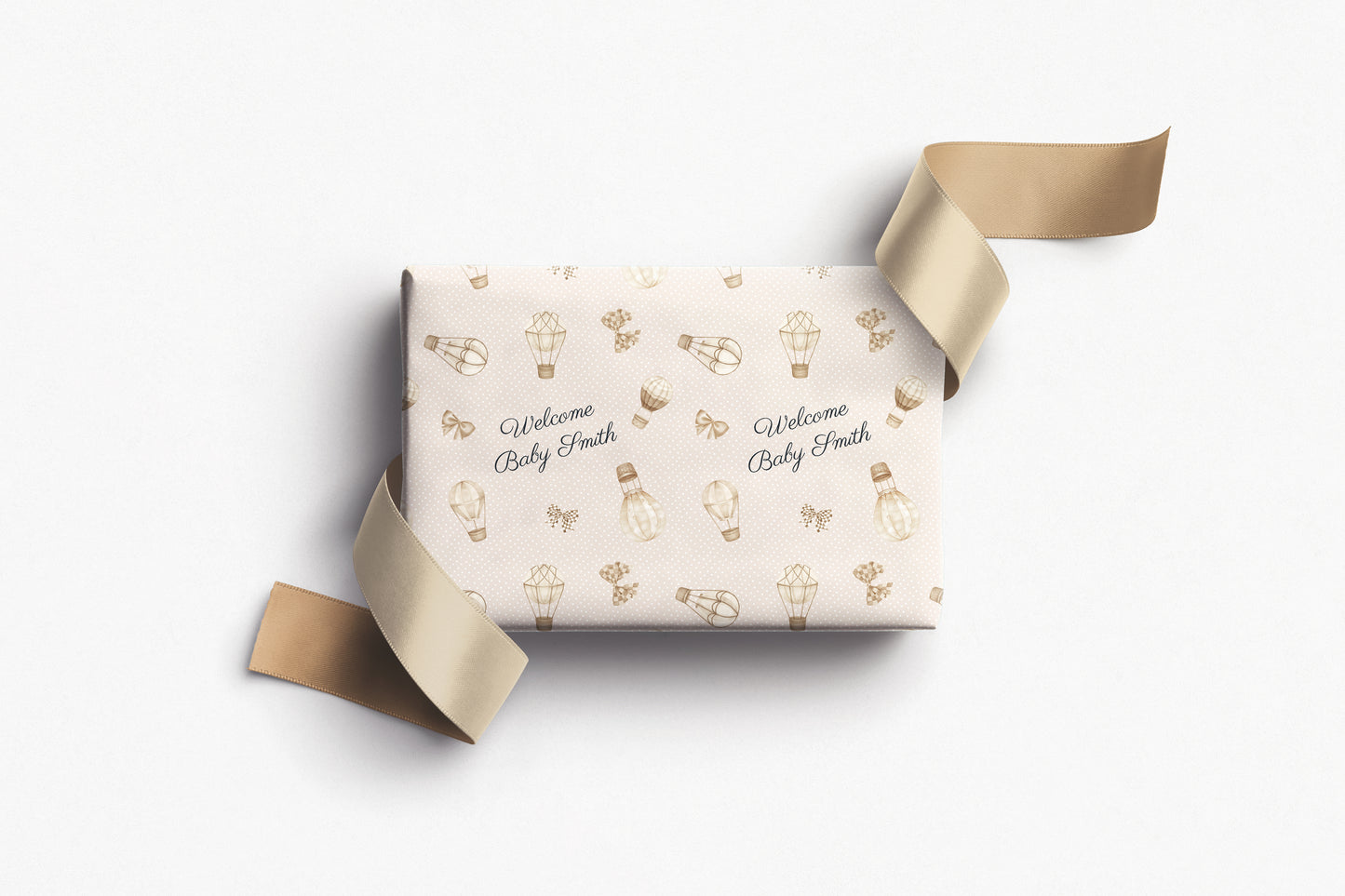 Personalised neutral baby wrapping paper with beige hot air balloons and custom text