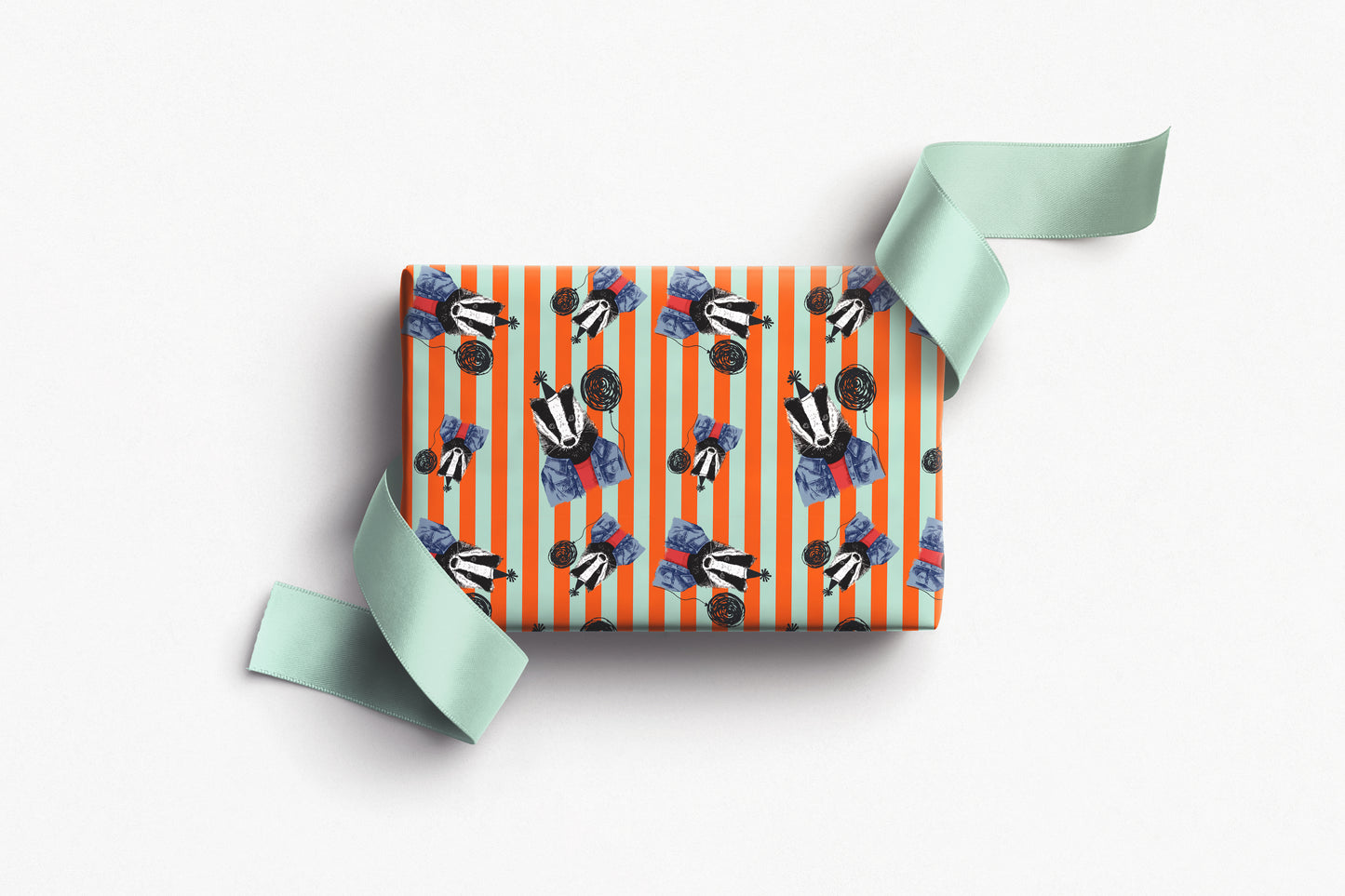 Badger wrapping paper with bold orange and mint stripes
