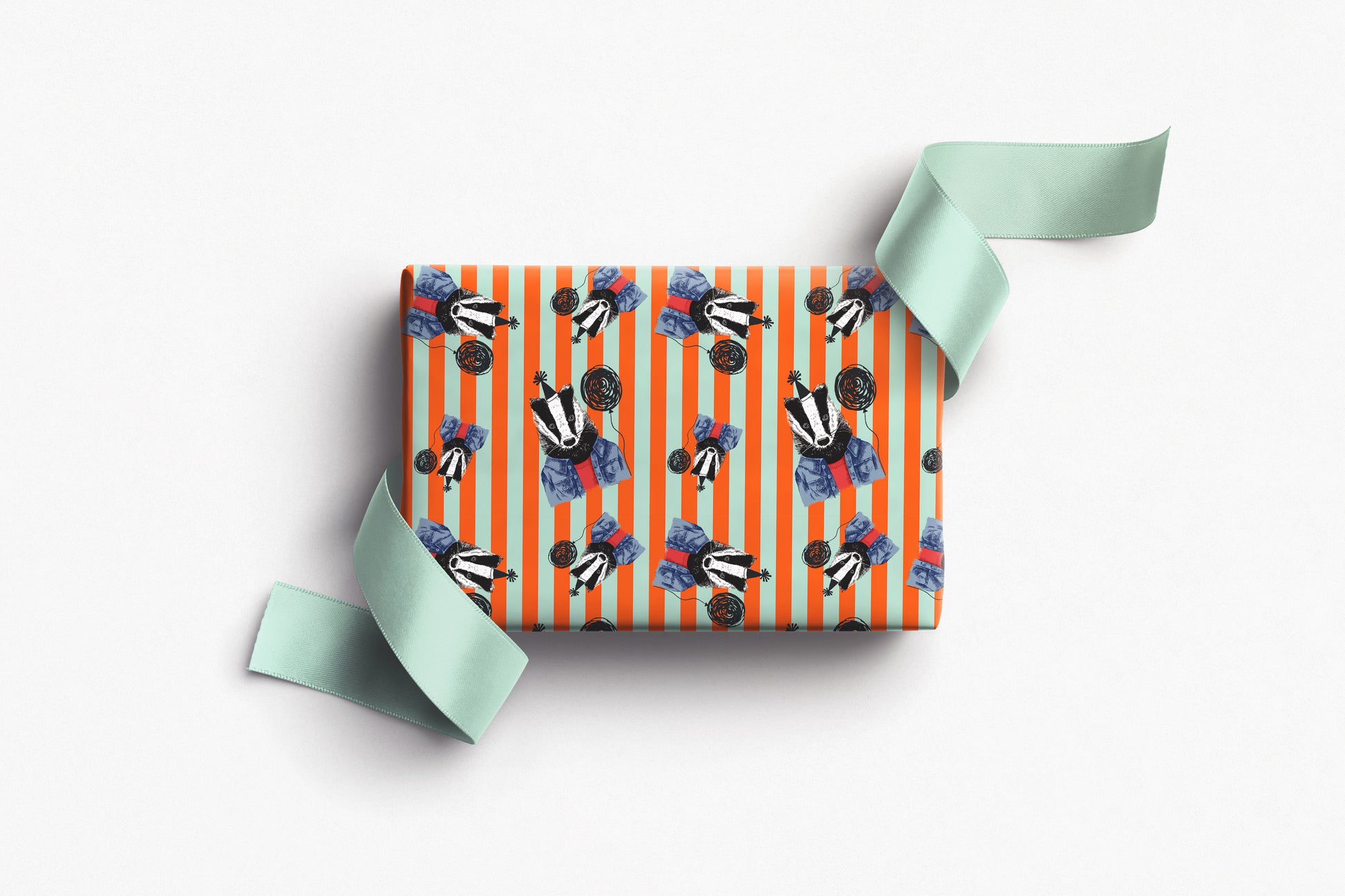 Badger wrapping paper with bold orange and mint stripes