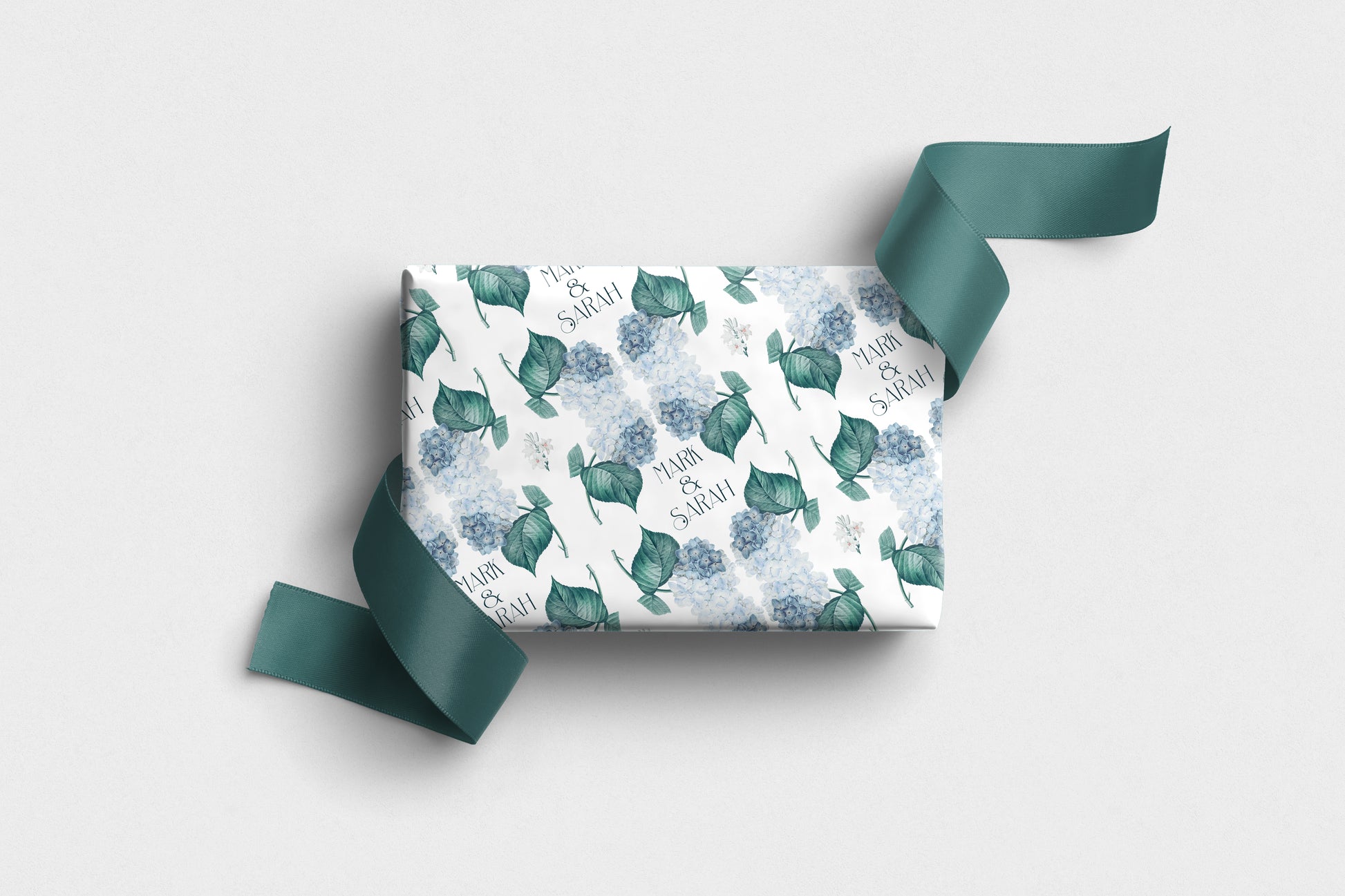 Personalised hydrangea wrapping paper with blue flowers and custom names