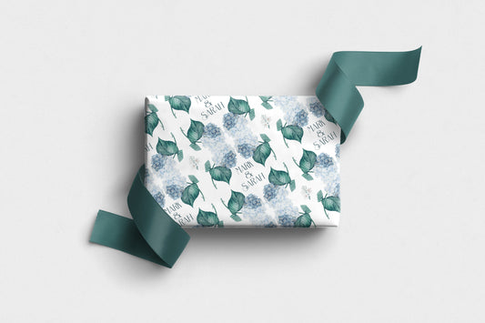 Personalised hydrangea wrapping paper with blue flowers and custom names