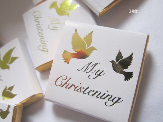  Elegant, personalized chocolate favors with a golden dove motif, suitable for christenings, baptisms, and other religious celebrations.