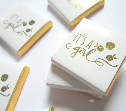 It's a Girl Baby Shower Chocolate Favours (Pack of 25)

Description: Elegant, personalized chocolate favors perfect for baby showers. They can be used as treats, for dessert tables, or as keepsakes.