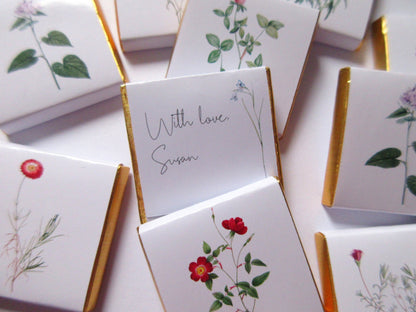 personalized chocolate for events like weddings and parties. Wild Flower Thank You Favours. The chocolates have botanical designs on the front and can be personalized on the back.