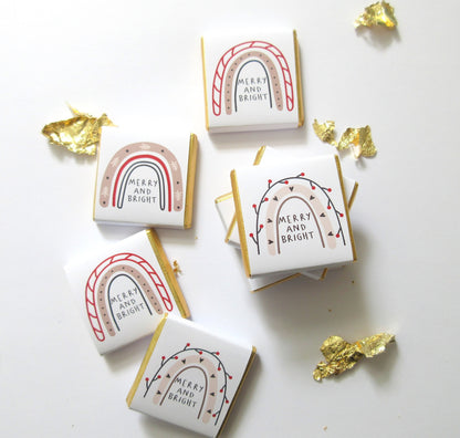Festive chocolate favours with a rainbow "Merry & Bright" design, personalised backs, Ideal for stocking fillers, sweet tables, and general Christmas treats.