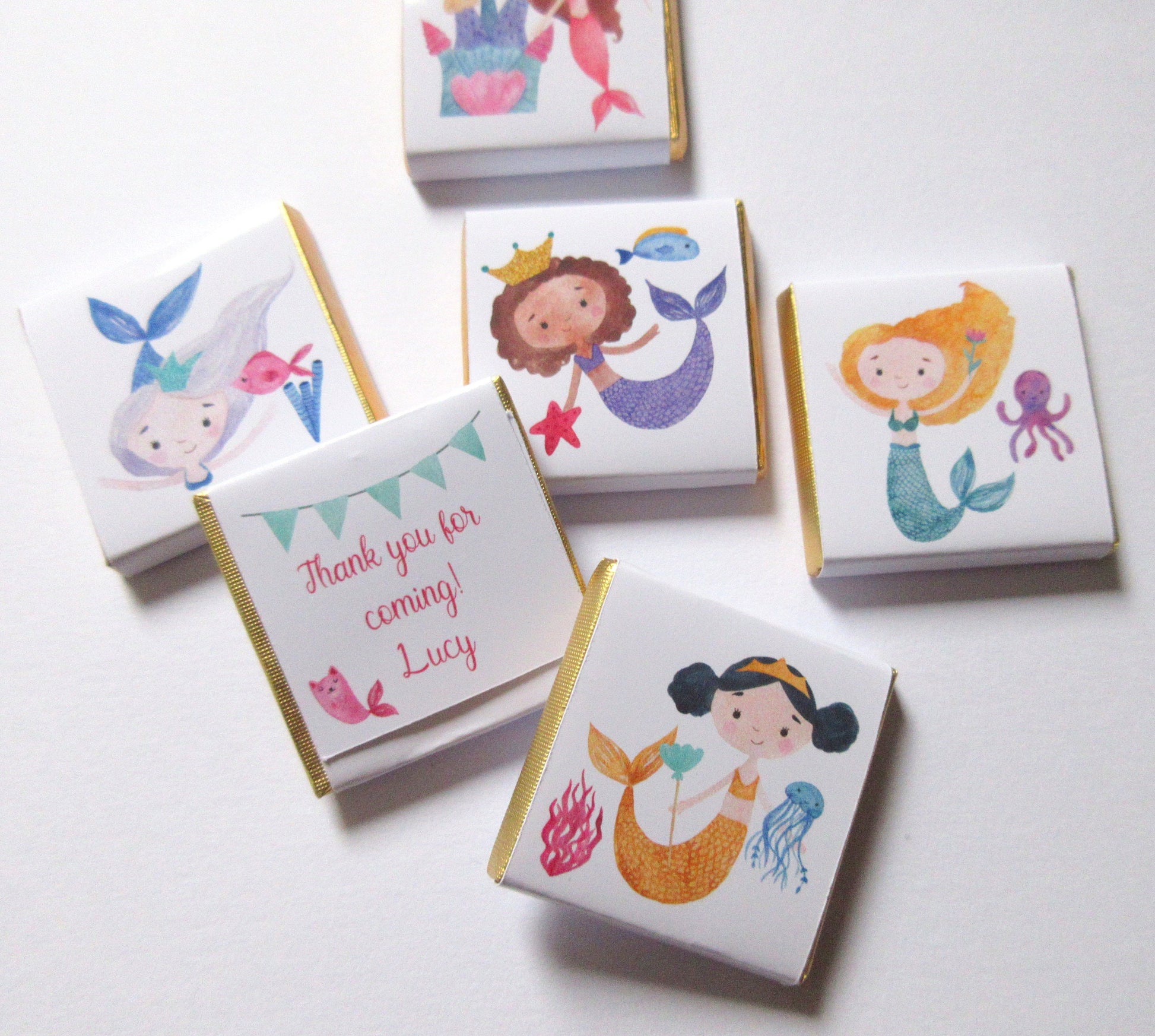 Mermaid-themed chocolate treats with a customizable message on the back.

Ideal for party favours or sweet tables.