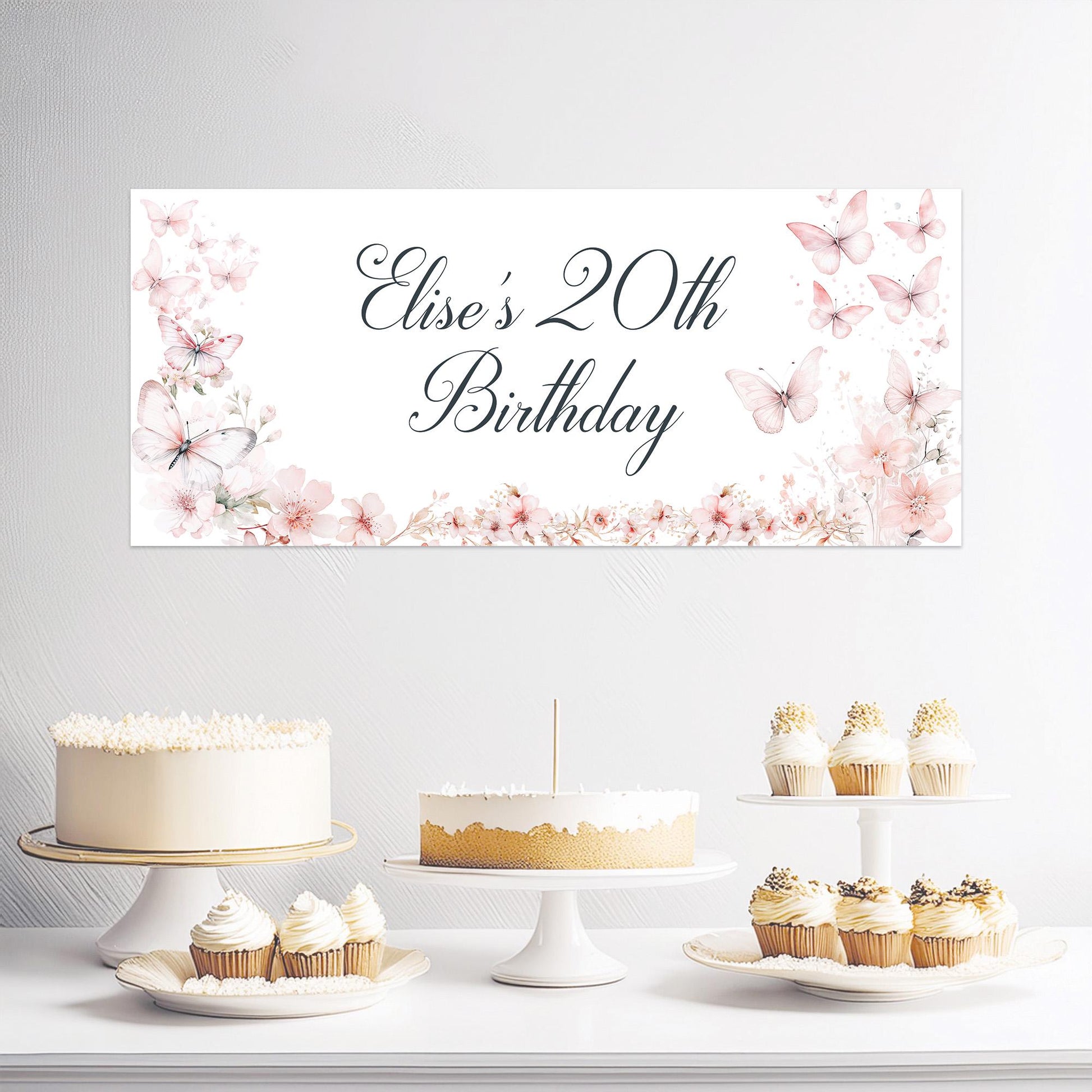 Personalised birthday banner on luxury satin paper featuring pink butterflies and blossom florals, customisable text, approximately 43 cm × 1 m