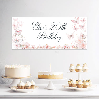 Personalised birthday banner on luxury satin paper featuring pink butterflies and blossom florals, customisable text, approximately 43 cm × 1 m