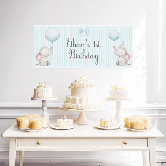 This product is a customizable baby elephant 1st birthday banner designed for boys in pastel blue.