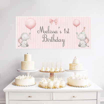 Personalised 1st birthday banner on luxury satin paper featuring a sweet pink baby elephant illustration with custom text option, approximately 43 cm × 1 m