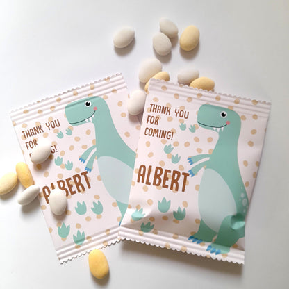 custom-made party bags with a dinosaur theme. Each bag is personalised with a "Thank you for coming!" message and the child's name, making them ideal as party favours or table decorations for a dinosaur-themed birthday.