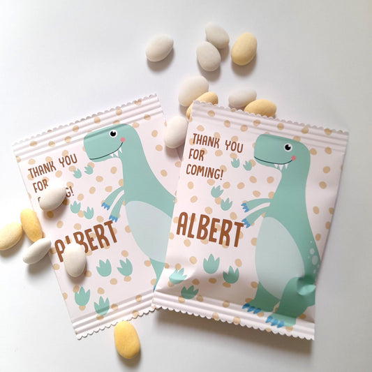 custom-made party bags with a dinosaur theme. Each bag is personalised with a "Thank you for coming!" message and the child's name, making them ideal as party favours or table decorations for a dinosaur-themed birthday.