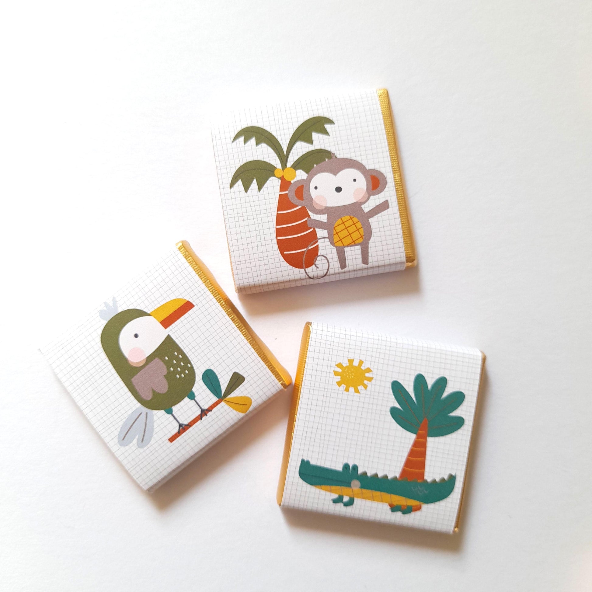 Personalised safari-themed chocolate favours.  Ideal as party treats or gifts for events like birthdays, baby showers, or christenings